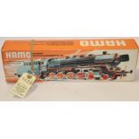 A scarce HAMO by Marklin HO scale German DB Class 44 2-10-0 tender locomotive. RN44690 in black