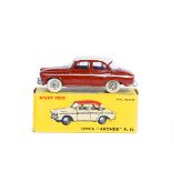 A French Dinky Toys Simca 'Aronde P.60 (544). An example in brown with cream roof, silver flash,