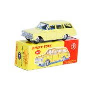 Dinky Toys Vauxhall Victor Estate Car (141). In yellow with blue interior, dished spun wheels with