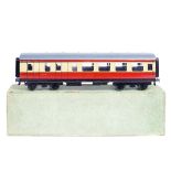 A Bassett-Lowke O Gauge BR coach (112/0). A brake third BR corridor bogie coach in cream and red