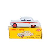 Dinky Toys Austin A105 Saloon (176). In light grey with red flash and wheels, with black treaded