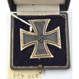 A 1939 Iron Cross 1st Class, with ferrous centre, in its purple velvet lined box, the lid