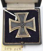 A 1939 Iron Cross 1st Class, with ferrous centre, in its purple velvet lined box, the lid
