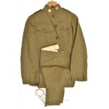 A WWI USA infantry OR’s khaki 4 pocket tunic, stand up collar with gilt roundel “US 174 NY” collar