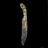 A Ceylonese knife piha kaetta. 19th century, blade 18cms with elaborate scrolled brass ferule and