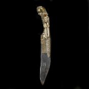 A Ceylonese knife piha kaetta. 19th century, blade 18cms with elaborate scrolled brass ferule and