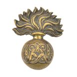 A Vic Sergeants and Musicians brass grenade cap badge of the Grenadier Guards, reversed and