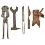 A WWI wire cutter, stamped “Wolseley 1915”, GC; a rifle mounted wire cutter (excavated); an