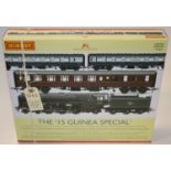 A Hornby OO gauge 'The 15 Guinea Special' set (R3607). Comprising a Britannia Class 4-6-2