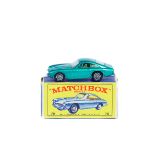 A Matchbox Series Ferrari Berlinetta (75b). In metallic green with wire wheels and a silver base.