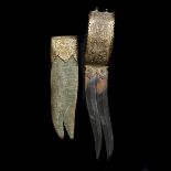 An Indian twin bladed dagger bich-hwa. Late 19th century, recurved DE blades 19cms, gilt copper