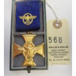 A Third Reich Police gold 25 year Long Service decoration, VGC, in its case with ribbon having