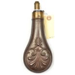 A copper powder flask “Shell & Bush” (Riling 372) common brass top, graduated nozzle 2¼-3 “Drams”,