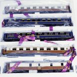 An M.T.H. O gauge 5-car SNCF passenger set. 2 salon cars and a baggage car in brown & cream and a