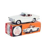 A Rare Tekno Volvo P1800 (825). In cream with deep red interior, hammered silver base with plated/