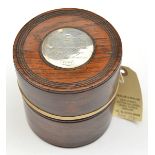 A turned darkwood cylindrical tobacco box, silver coloured disc, 1-7/8”, in lid, engraved “Tobacco