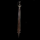 A South Indian sword khanda. Broad DE blade 88.5cms swollen towards the partizan-shaped tip, iron