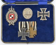 A WWI style Bavarian Observer’s badge, of die struck white metal and enamel; a 1914 Iron Cross 1st
