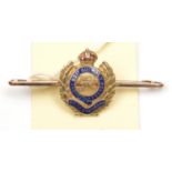 A 15ct gold R Engineers sweetheart tie pin, enamelled Geo V badge as for cap. GC Plate 4