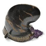 A Japanese black lacquered harikake parade helmet kabuto. in the form of a courtier's hat (naga-