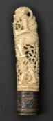 A carved ivory handle from a Burmese letter-opener. Early 20th century, 11cms, hilt carved as a
