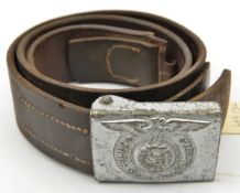 A Third Reich Waffen SS leather belt, with silver painted steel buckle. GC (light service wear to