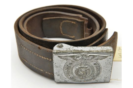 A Third Reich Waffen SS leather belt, with silver painted steel buckle ...