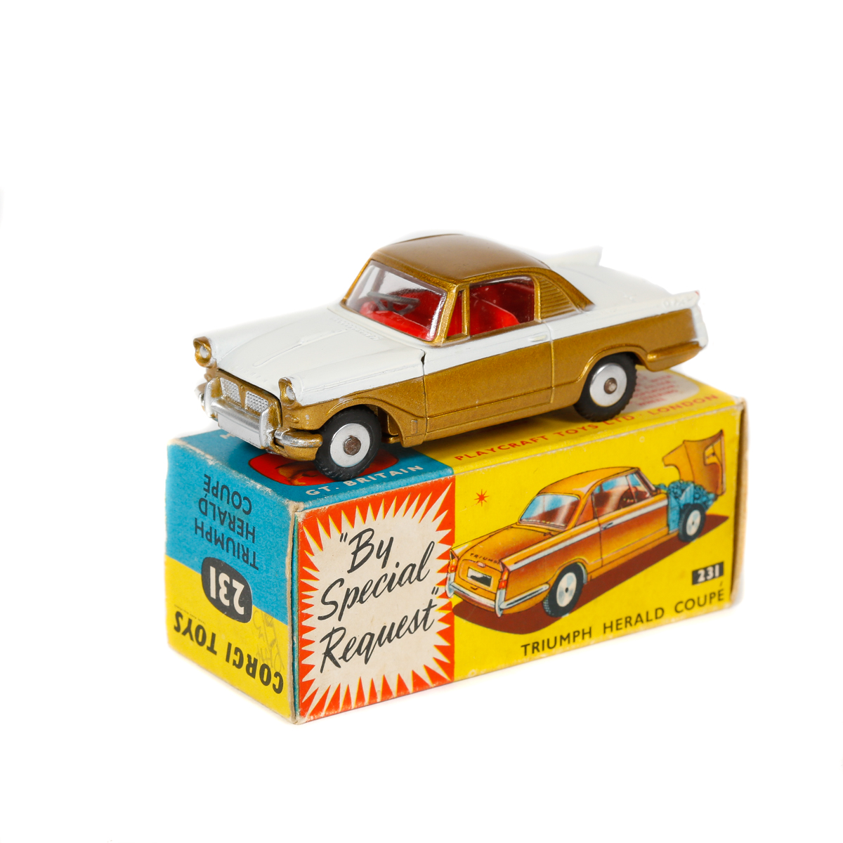 Corgi Toys Triumph Herald Coupe (231). In white and metallic gold with red interior. Harder to