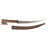 A North African dagger nimcha. Early 20th century, curved SE blade 26cms engraved and with a