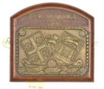 A cast brass rectangular badge of HMS Carlisle, cruiser 1918-49, showing the Arms of Carlisle and