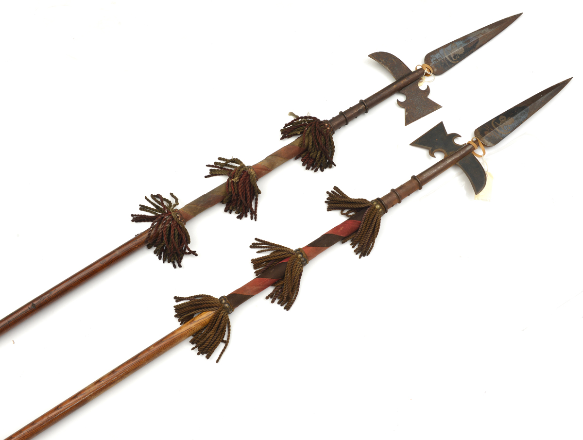 A pair of Victorian Royal Forester’s ceremonial halberds, blued steel heads with tubular sockets,