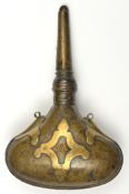 An Indo-Persian brass powder flask.19th century, swollen purse-shaped body with applied devices