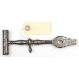 A 17th century wheellock spanner/screwdriver, with double ended tubular spanner, baluster handle and