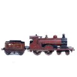 A Bing Gauge One clockwork Midland Railway 4-4-0 tender locomotive. In lined maroon livery with