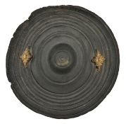 An Omani thick hippopotamus hide shield buckler. 19th century or earlier, 25cms diameter, of conical