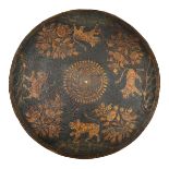 An Indian lacquered shield dhal. c.1900, 47cms, without bosses or fittings, lacquered on the outside