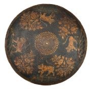 An Indian lacquered shield dhal. c.1900, 47cms, without bosses or fittings, lacquered on the outside