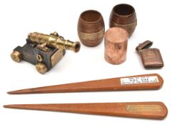 7 interesting souvenir items: 2 miniature barrels “From the teak of HMS Iron Duke”; a paper knife “