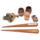 7 interesting souvenir items: 2 miniature barrels “From the teak of HMS Iron Duke”; a paper knife “