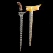 A Balinese dagger kris. Straight DE blade 48cms with distinct stepped pattern pamor, silver cup