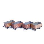 4 Carette for Bassett-Lowke Gauge One tinplate 7-plank open wagons. All in Great Northern livery.