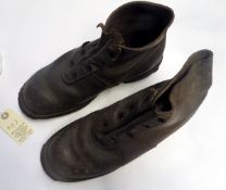 A pair of WWI German leather ankle boots, with iron bound toes and heels and hob nail soles, the