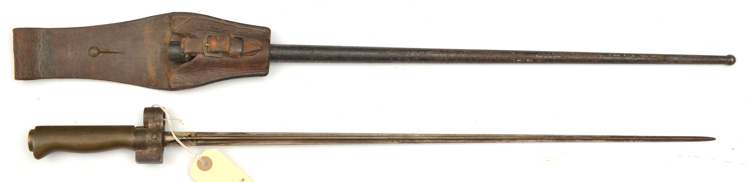 A Lebel bayonet, without quillon, in its steel scabbard numbered 221156 en suite with hilt, brown