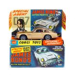 Corgi Toys James Bond 'Goldfinger' Aston Martin D.B.5 (261). In metallic gold with red interior,