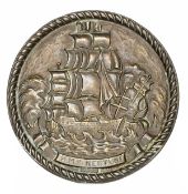 A cast brass circular badge of HMS Neptune, battleship 1909-1922, depicting the original fully