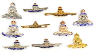 5 R Artillery enamelled sweetheart tie pins, including one marked “9ct” and 3 “Sterling”, 4