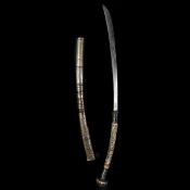 A good Burmese silver mounted sword dha.19th century, SE blade 56cms swollen towards the tip,