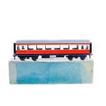 A Bassett-Lowke O Gauge BR coach (113/0). A third class BR corridor bogie coach in cream and red