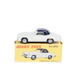 French Dinky Mercedes 190SL (526). Example in cream with black roof and ridged plated wheels. Boxed.