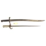 A Lebel bayonet, WM grip, hooked quillon and round button catch (blade tip slightly bent), and a
